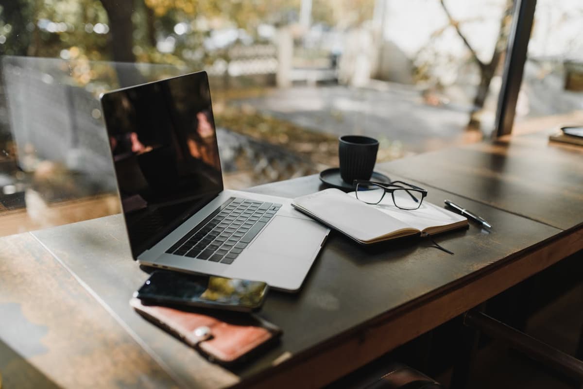 Modern workspace with laptop and coffee
